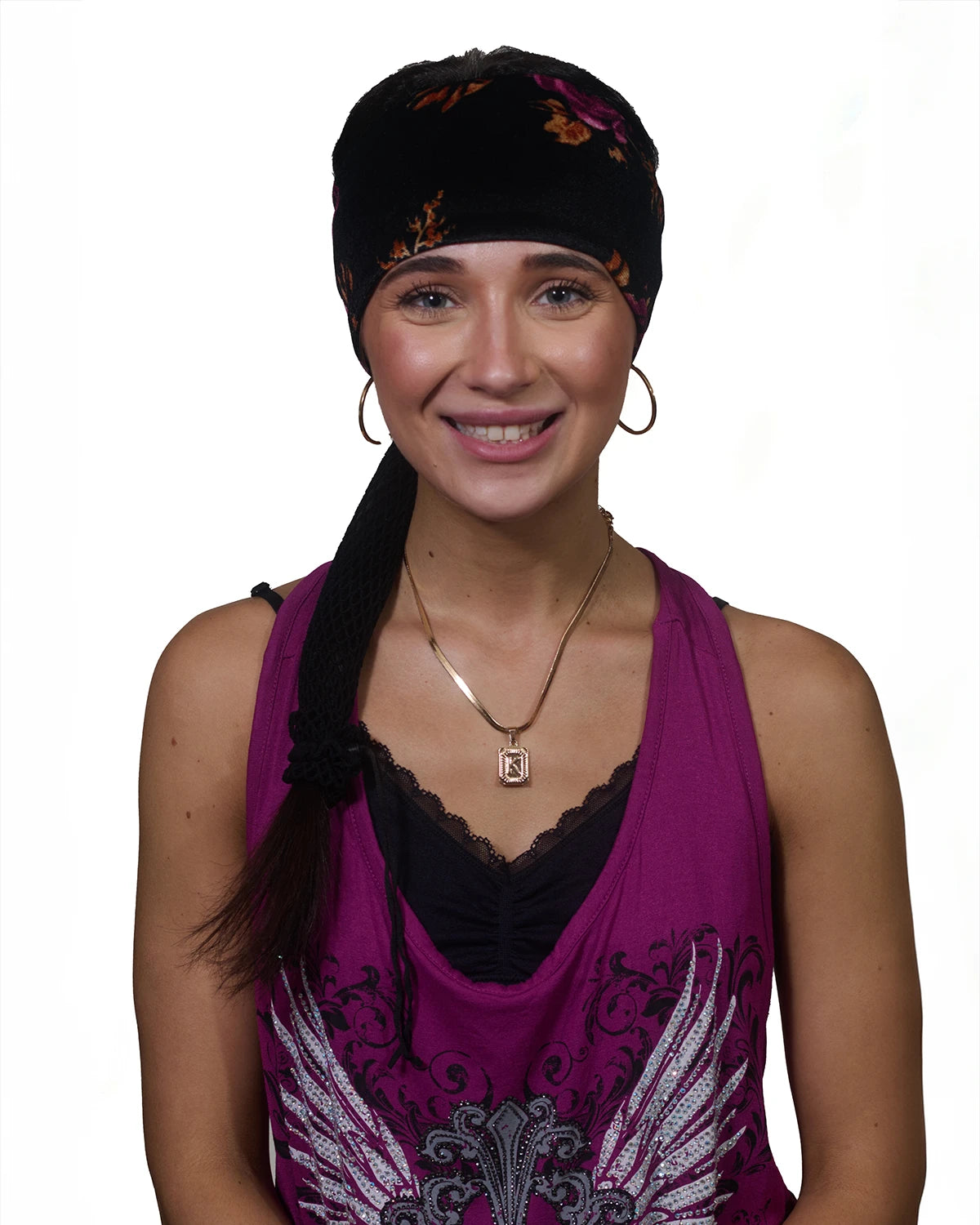 Black Floral wide headband with ponytail protector, front view on female model.