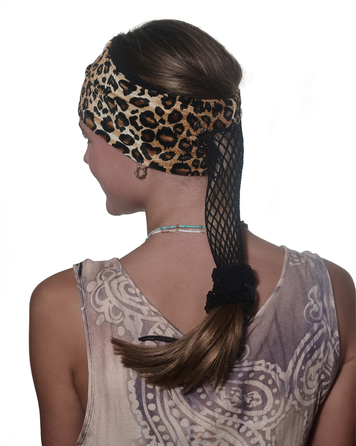 Cheetah print Wide headband with ponytail protector, back view on female model.