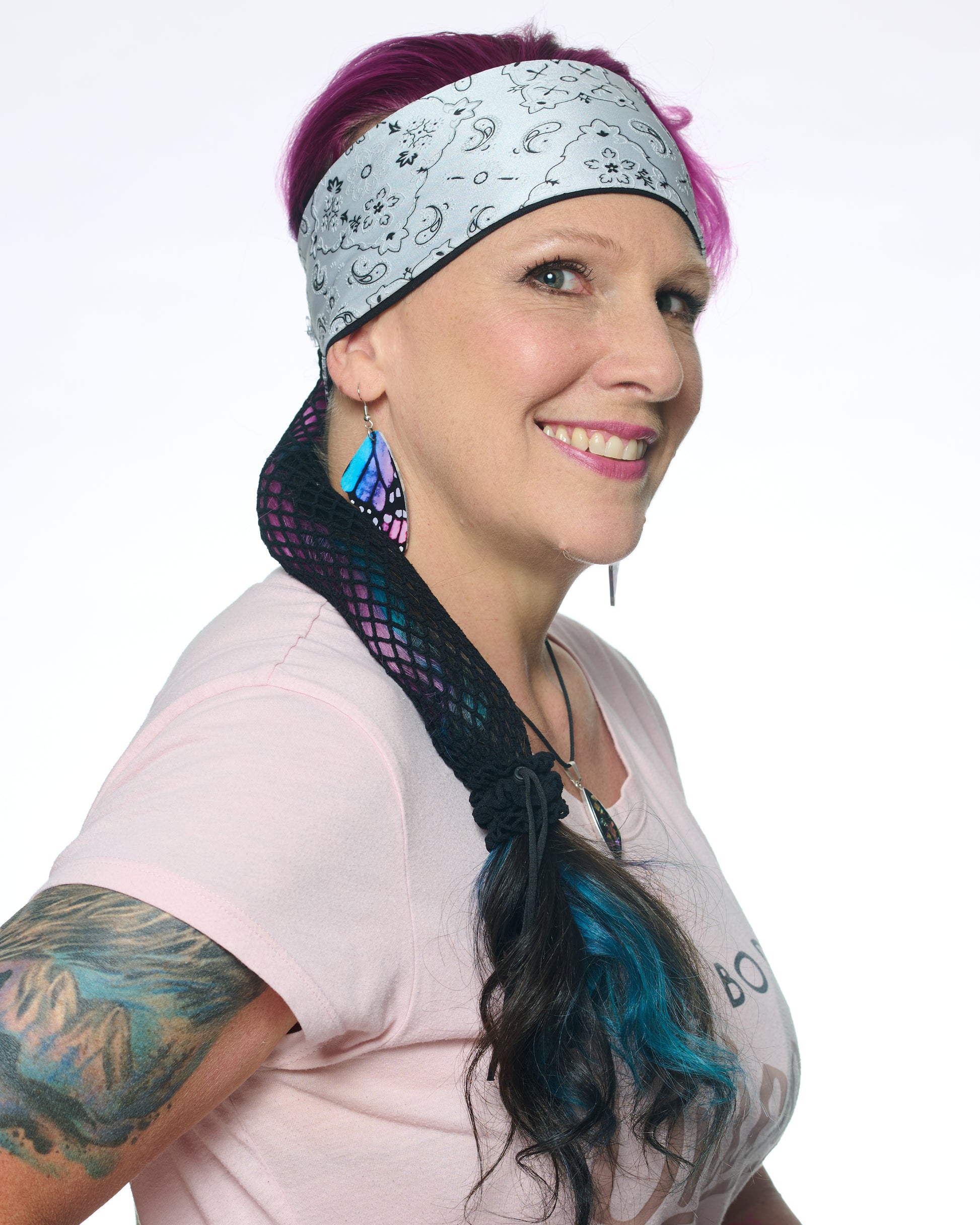 White and Black Elegance Bandana headband with ponytail protector, side view on female model.