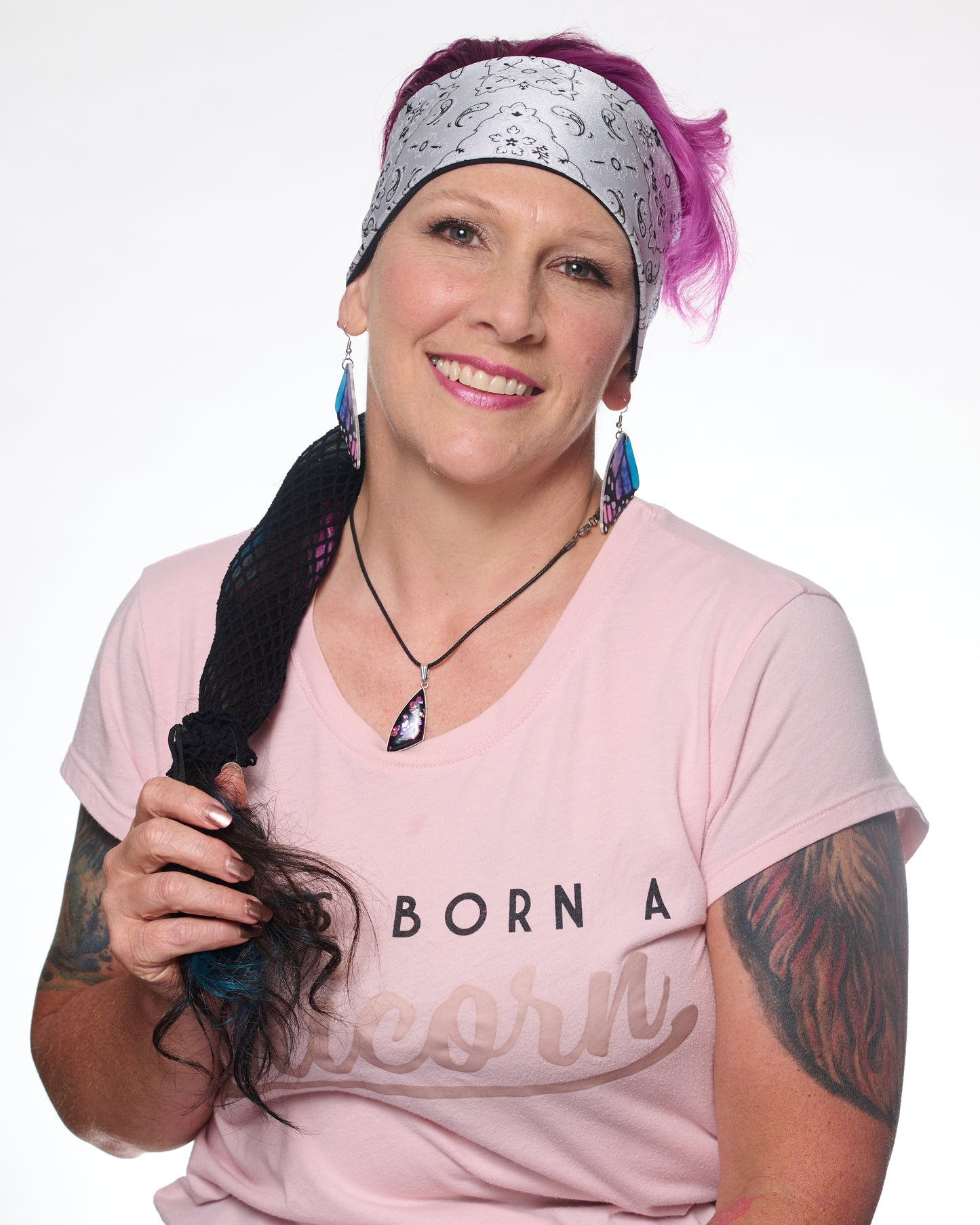 White and Black Elegance Bandana headband with ponytail protector, front view on female model.