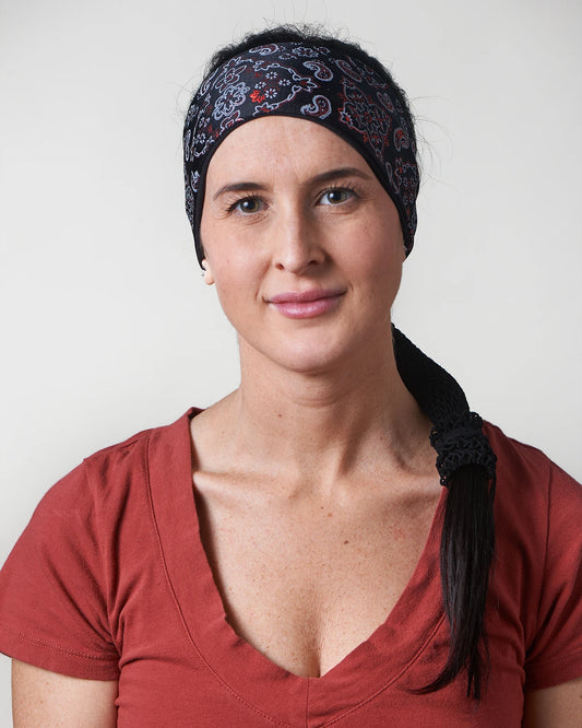 Racy Black and Red Bandana headband with ponytail protector, front view on female model.