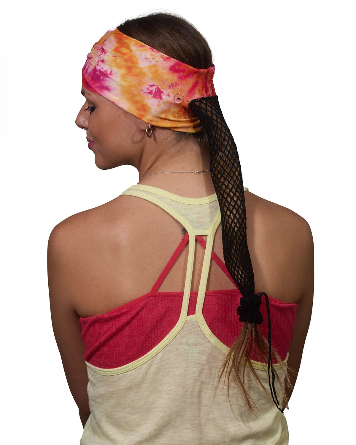 Orange-Yellow Vibrance Tie-Dye wide headband with ponytail protector, back view on female model.