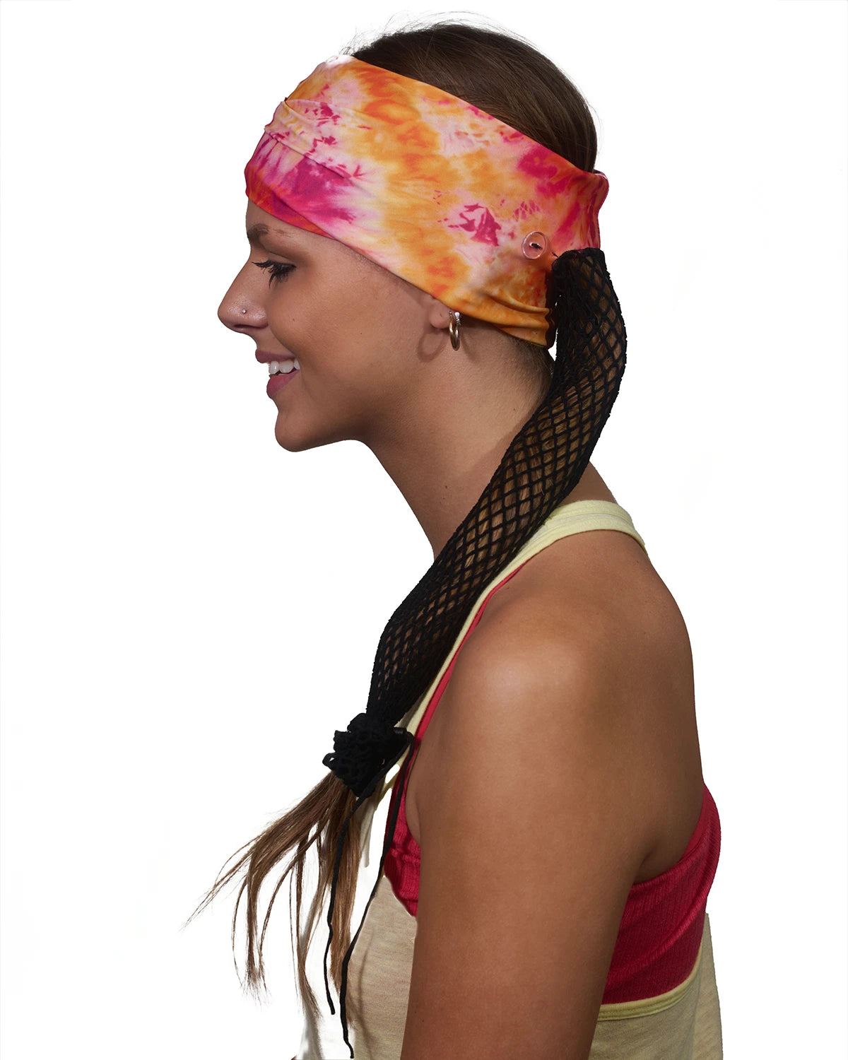 Orange-Yellow Vibrance Tie-Dye wide headband with ponytail protector, side view on female model.