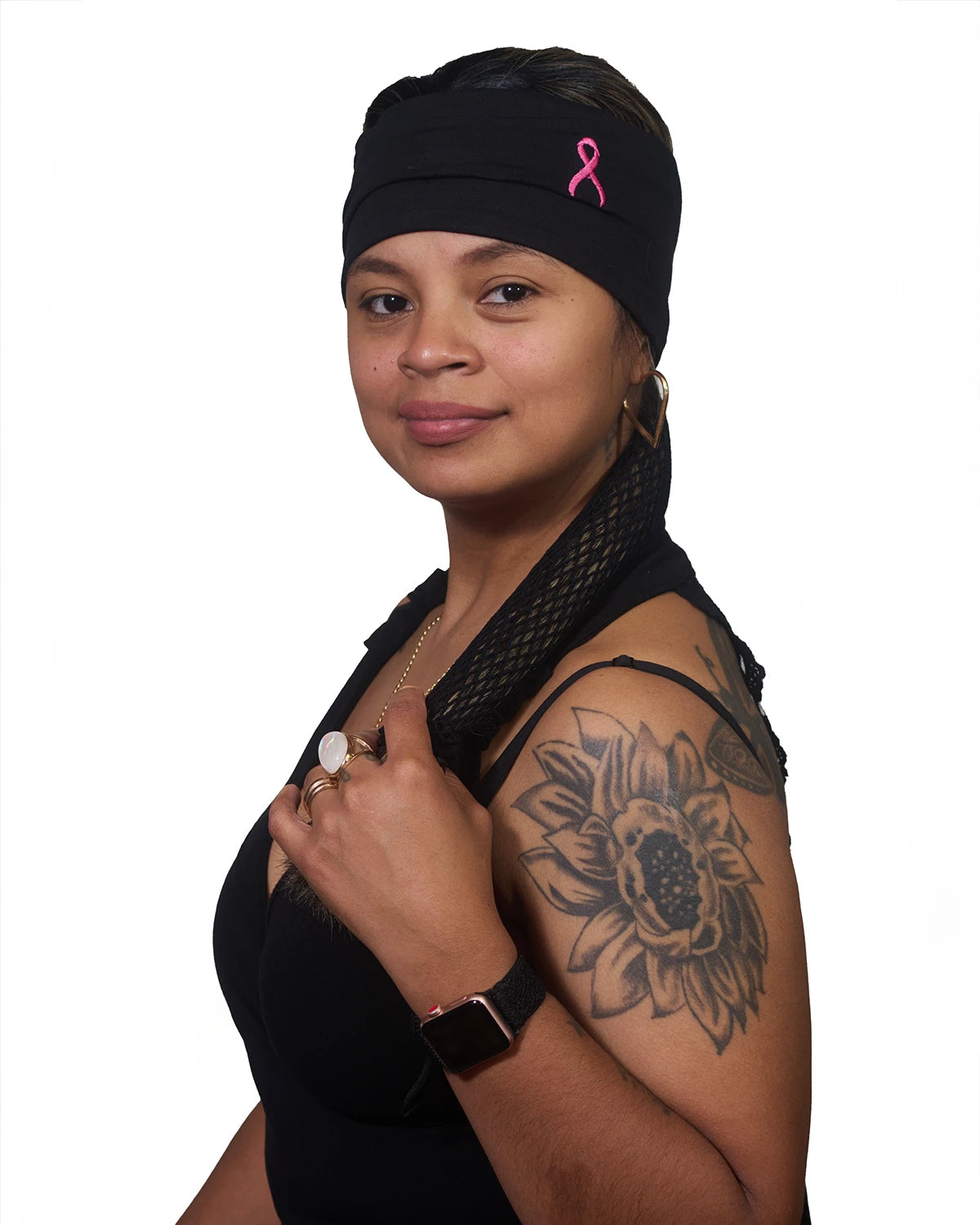 Pink Thunderstorm Cancer Awareness wide headband with ponytail protector, reversed front view on female model.