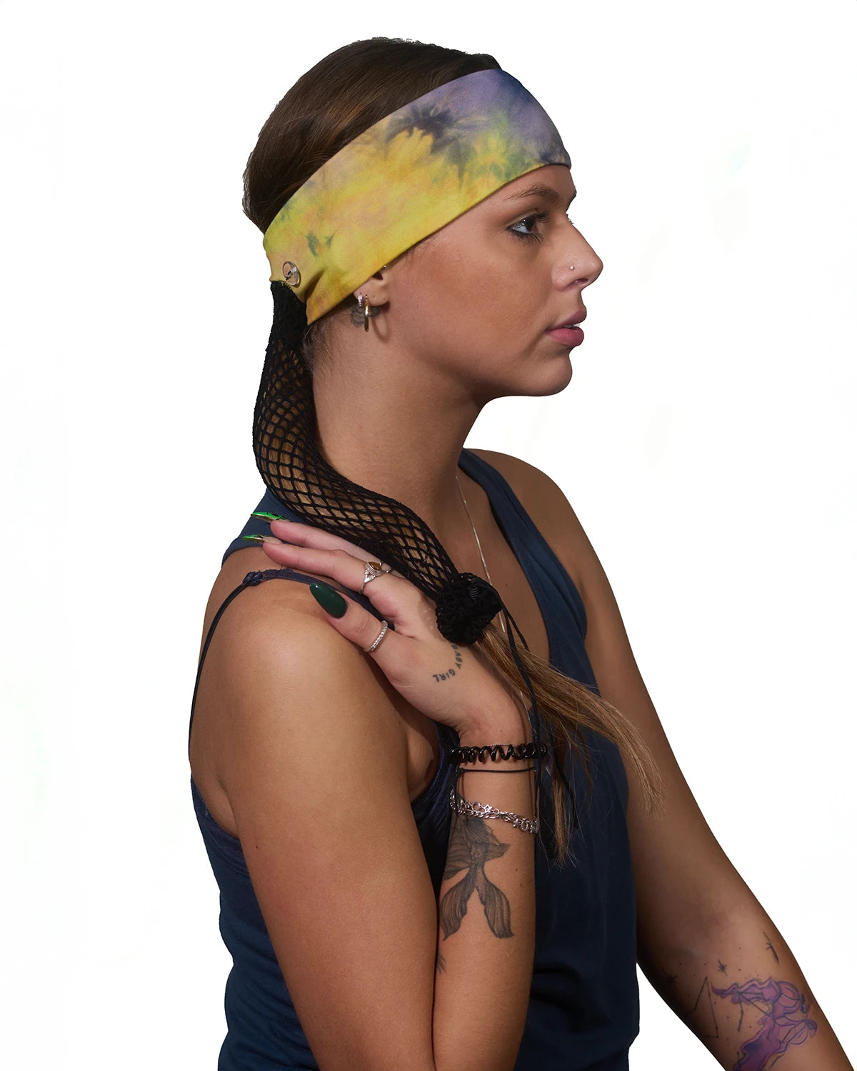 Blue and Yellow Messed Up Tie-Dye headband with ponytail protector, side view on female model.