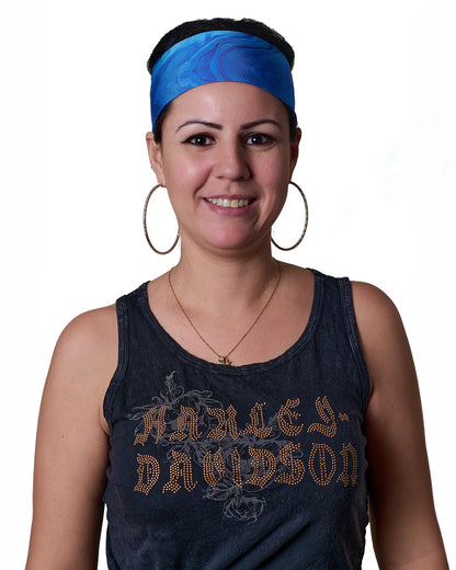 Blue Vibrance Tie-Dye headband with ponytail protector, front view female model.