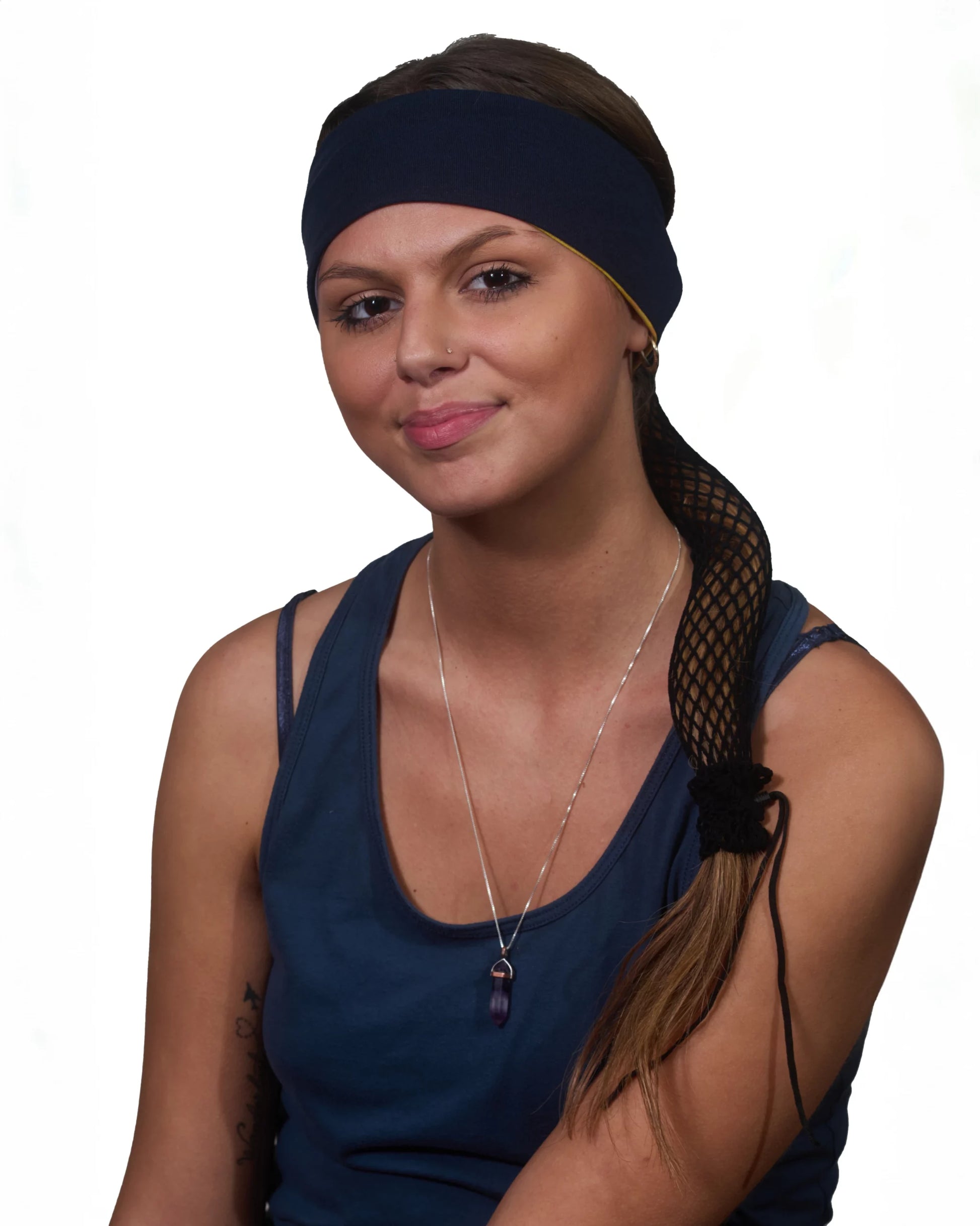 Blue Vibrance Tie-Dye headband with ponytail protector, reverse front view female model.