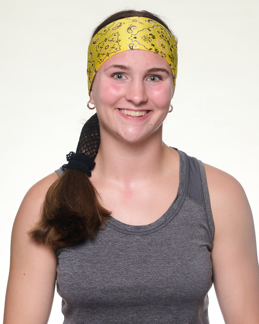 Yellow Brilliance Bandana headband with ponytail protector, front view on female model.