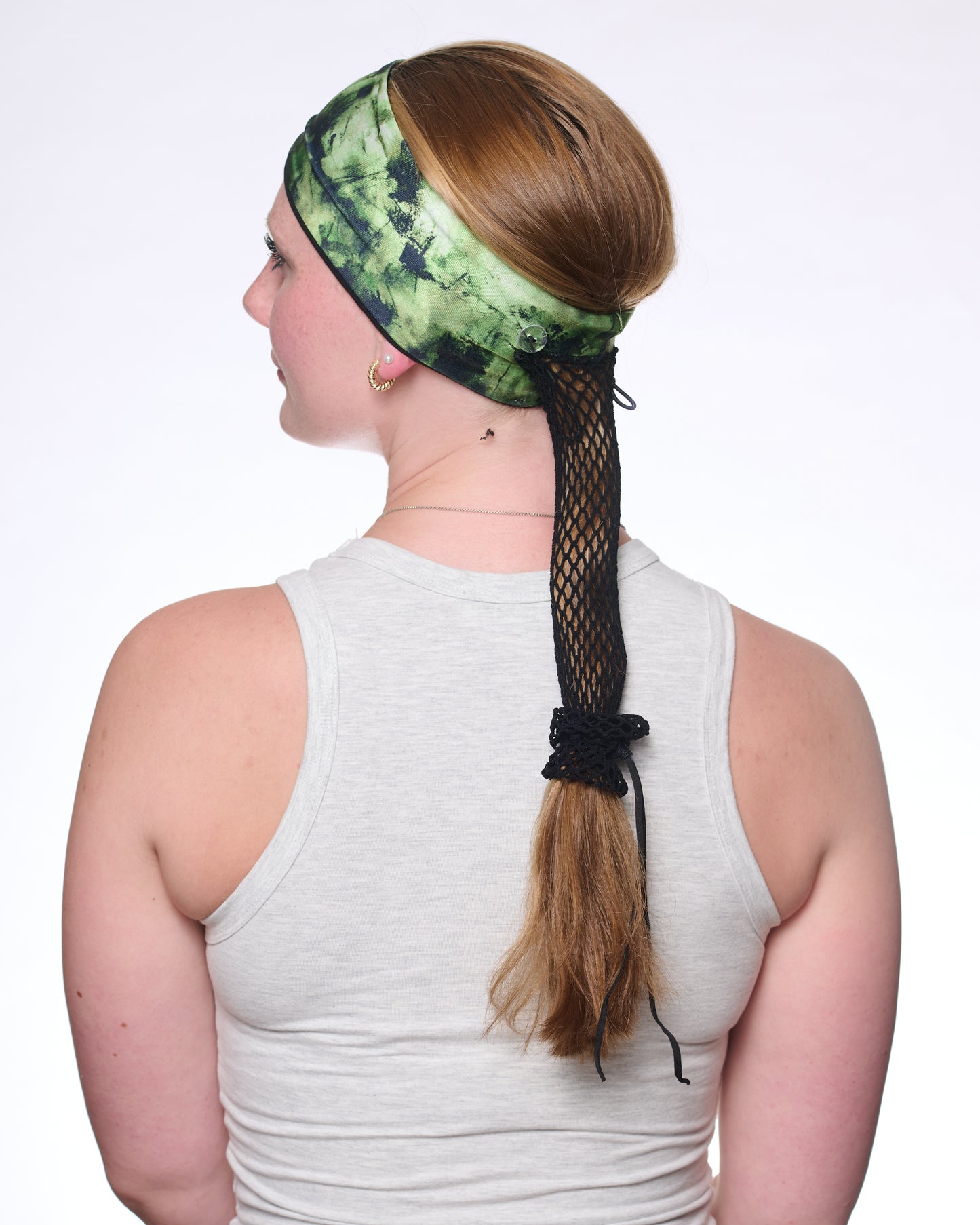 Green Tie Dye Narrow headband, side view on female model.