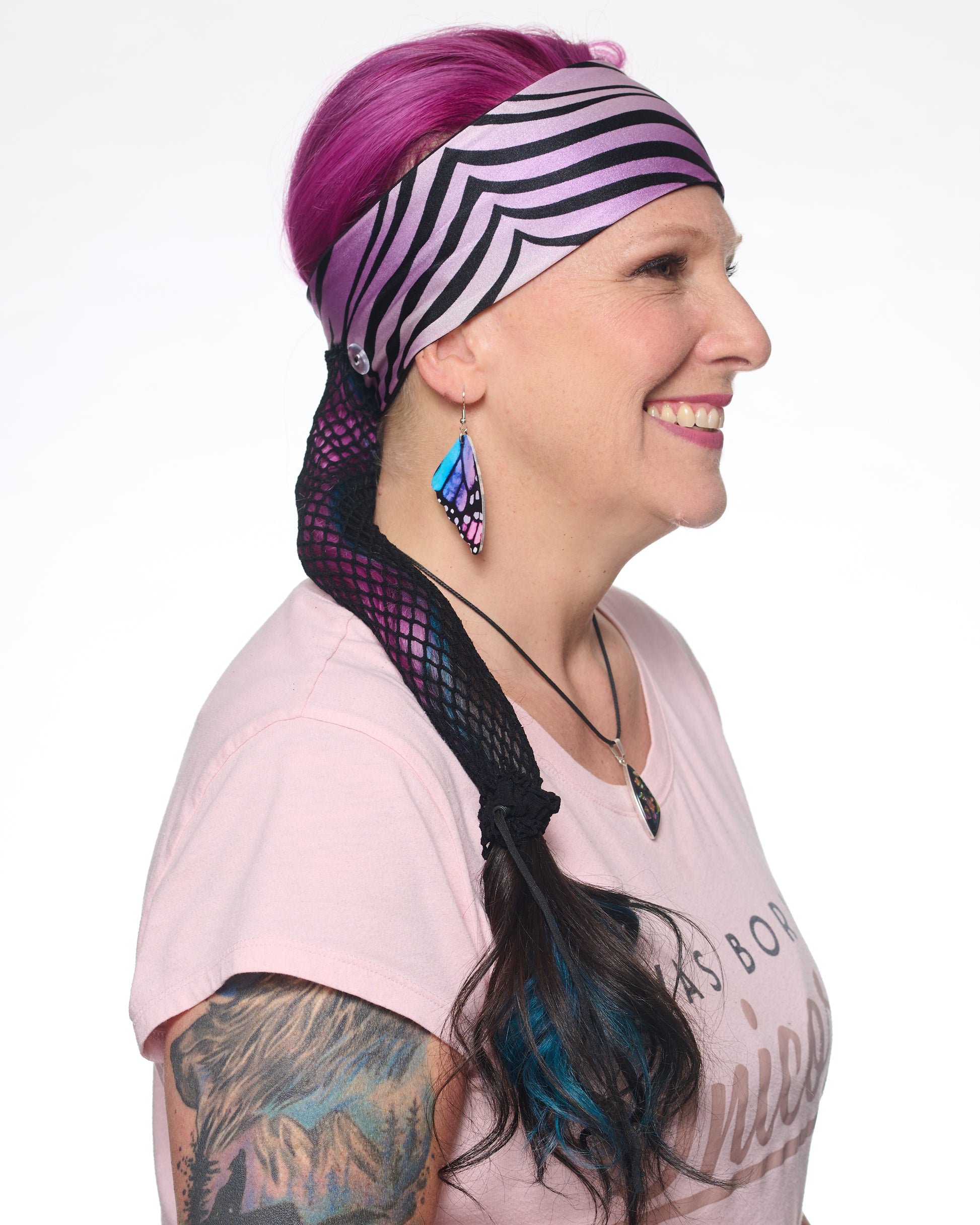 Zebra pattern headband, side view female model.