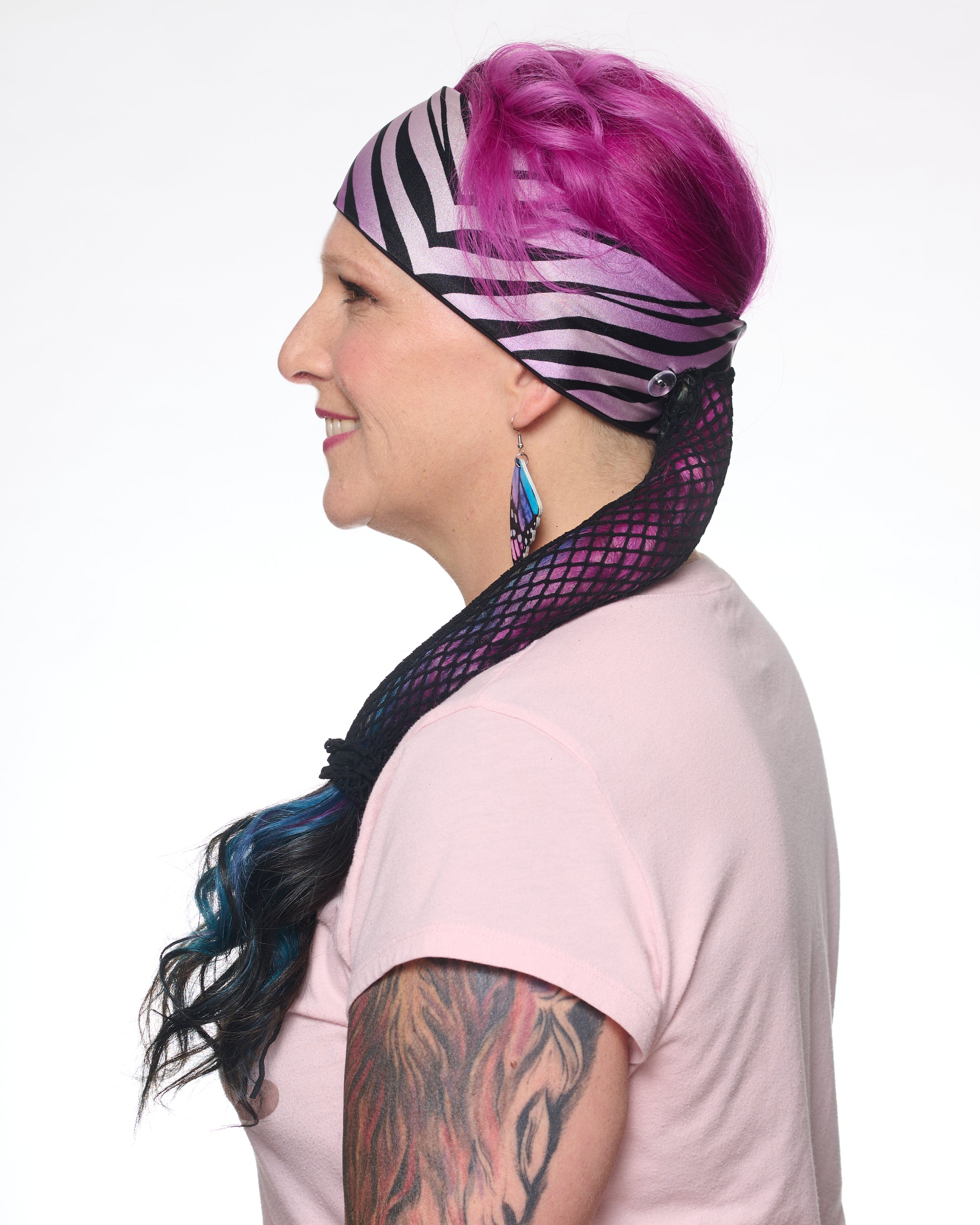 Zebra pattern headband, side view female model.