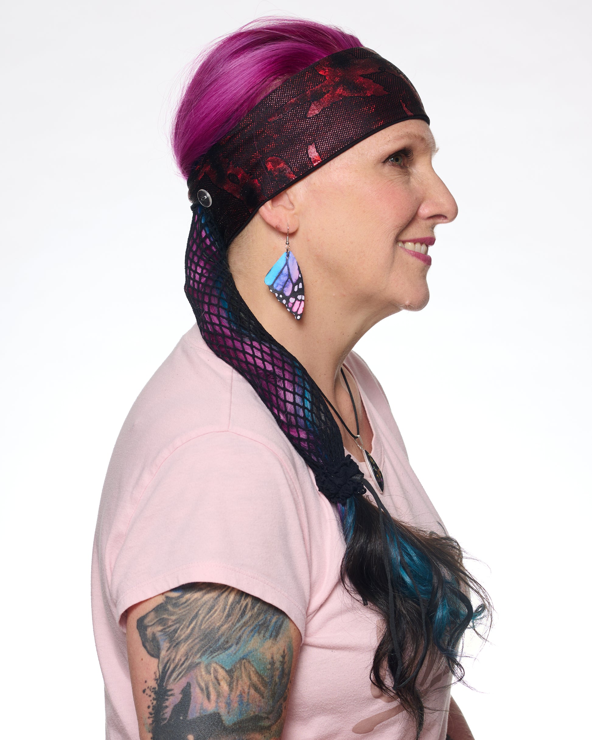 Red Shimmer Holographic headband with ponytail protector, side view on female model.