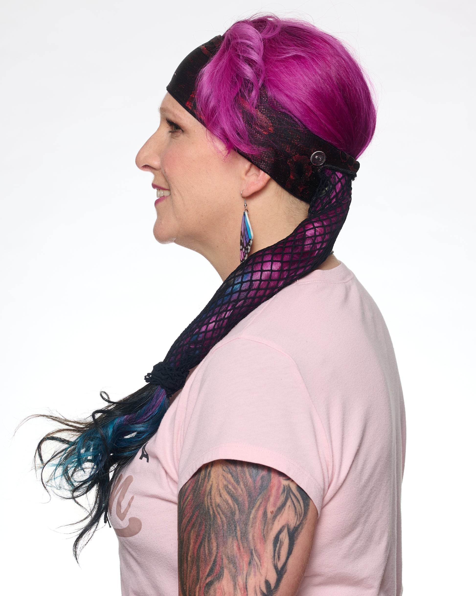 Red Shimmer Holographic headband with ponytail protector, side view on female model.