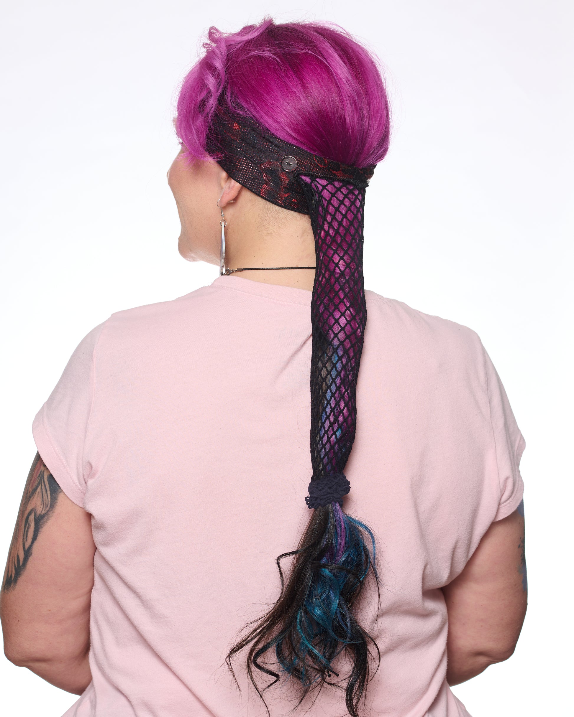 Red Shimmer Holographic headband with ponytail protector, back view on female model.