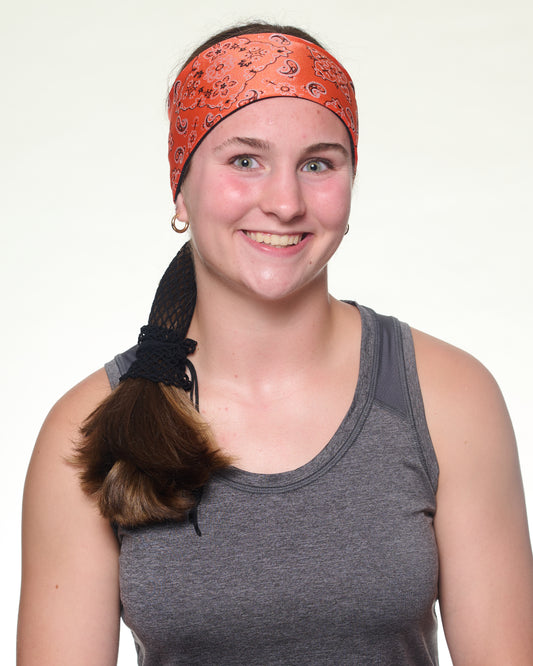 Orange Sunset Bandana Narrow headband, front view on female model.