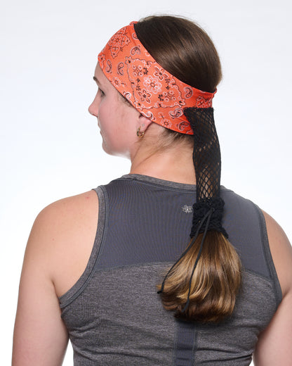 Orange Sunset Bandana Narrow headband, back view on female model.