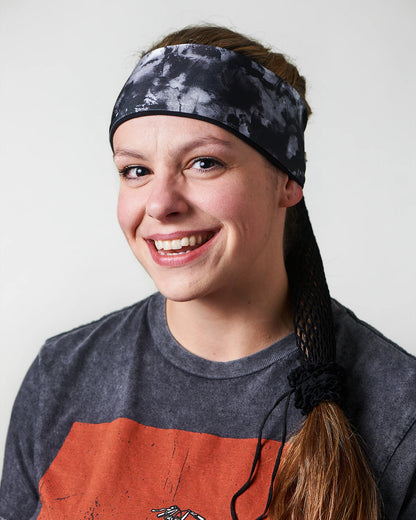 Gray Classic Tie-Dye headband with ponytail protector, front view female model.