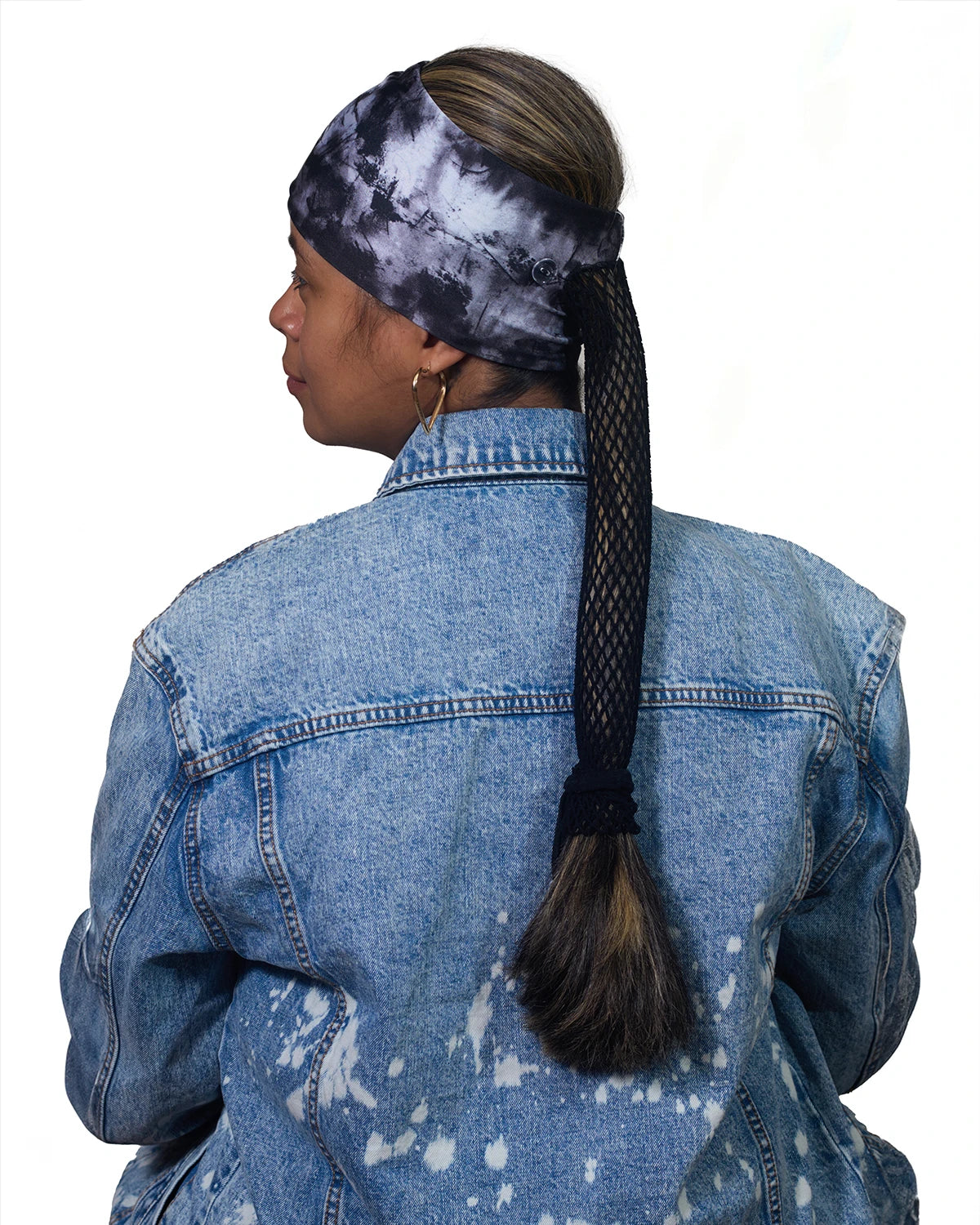 Gray Classic Tie-Dye wide headband with ponytail protector, back view female model.