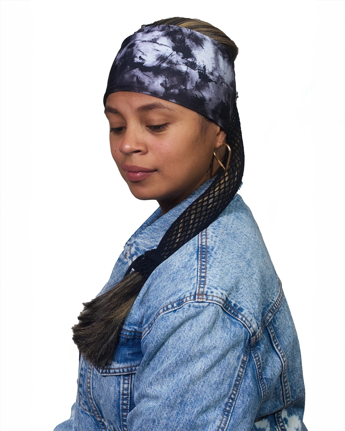 Gray Classic Tie-Dye wide headband with ponytail protector, side view female model.