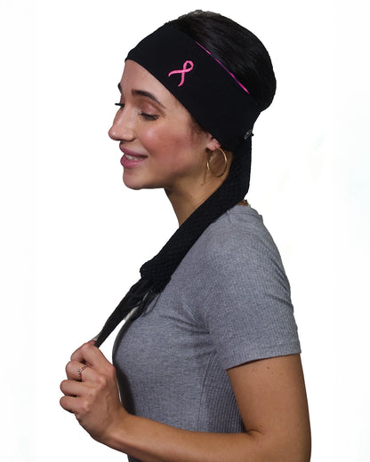 Pink Thunderstorm Cancer Awareness headband with ponytail protector, reverse side view on female model.