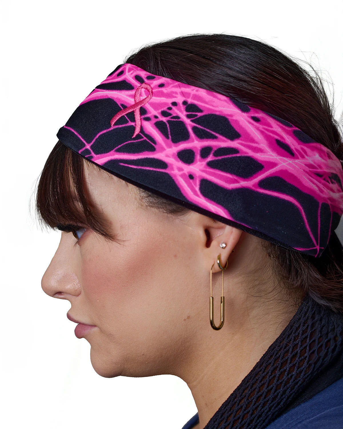 Pink Thunderstorm Cancer Awareness headband with ponytail protector, side view on female model.